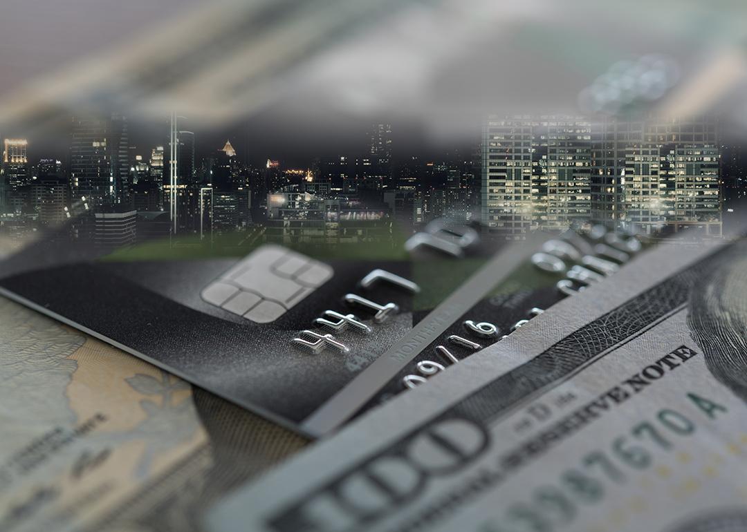 Collage of credit cards, finance and city buildings for the concept of credit score.