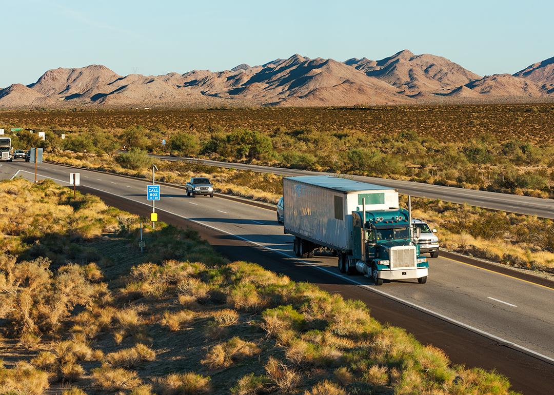 A truck along with other vehicles passing by the I-10 in Arizona.