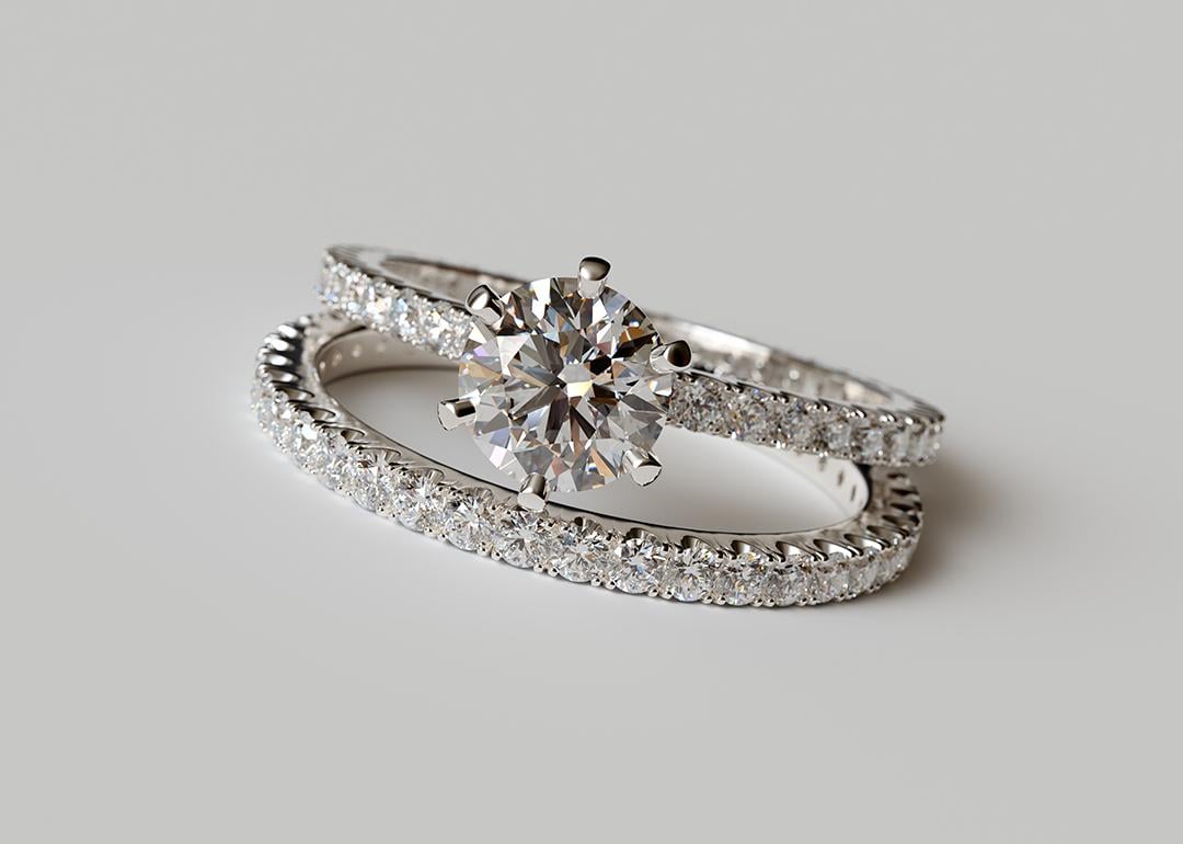 A set of classic eternity-style diamond wedding band and ring.