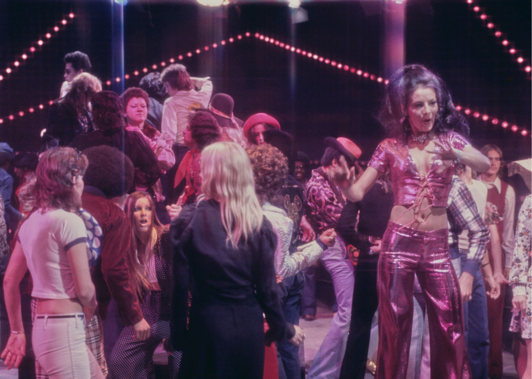 Clubbers on the dancefloor in a nightclub, circa 1975. 