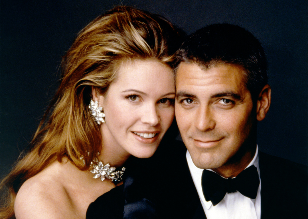 Australian model and actress Elle Macpherson and American actor George Clooney on the set of 'Batman & Robin,' 1997.