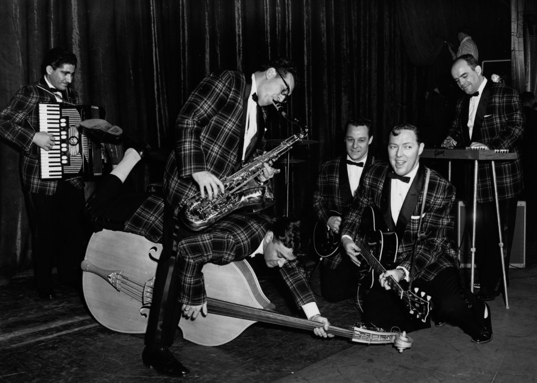 Rock 'n' roll group Bill Haley And His Comets, seen here during rehearsals in London for their first British performance, circa 1957.