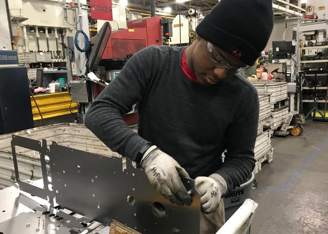 A student working at apprenticeship at Lincoln Electric in Cleveland, Ohio.