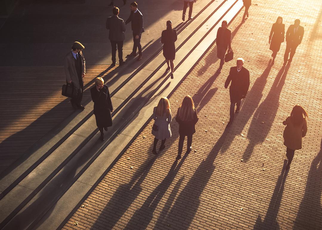 Business people walking to work in the morning in a city area.