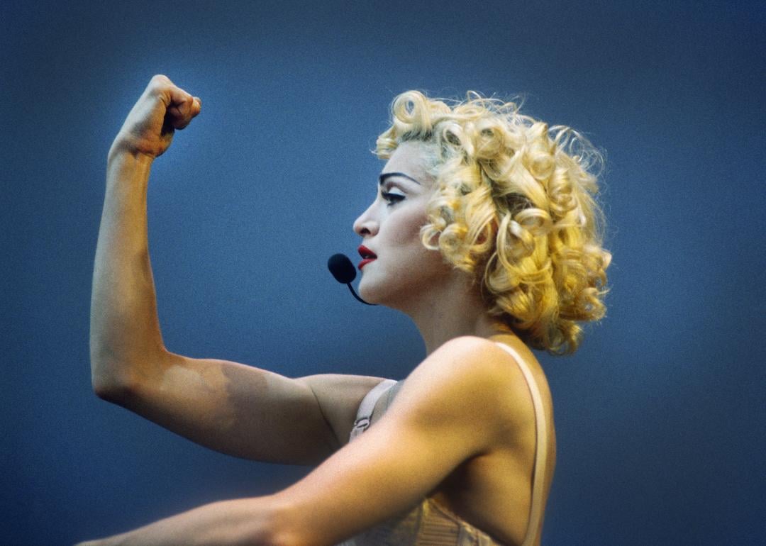 Madonna wearing her iconic Jean Paul Gaultier corset on her Blonde Ambition Tour in 1990.