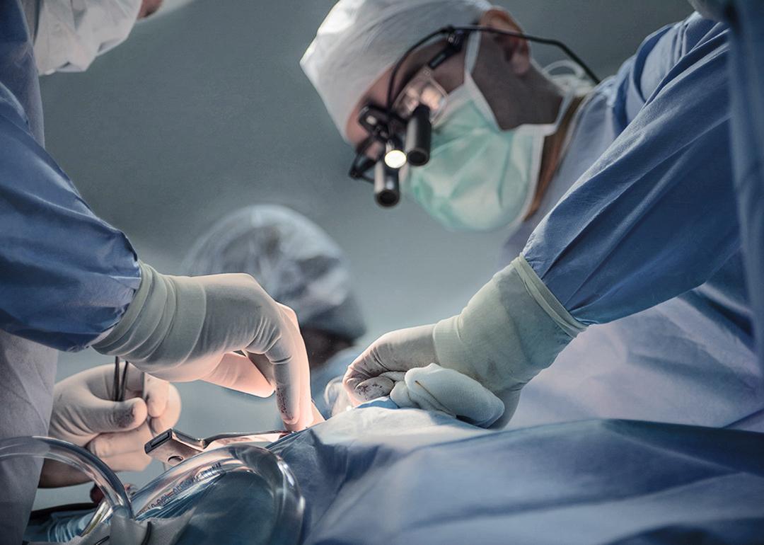Doctors perform surgery of a cardiac stent transplant in a hospital.