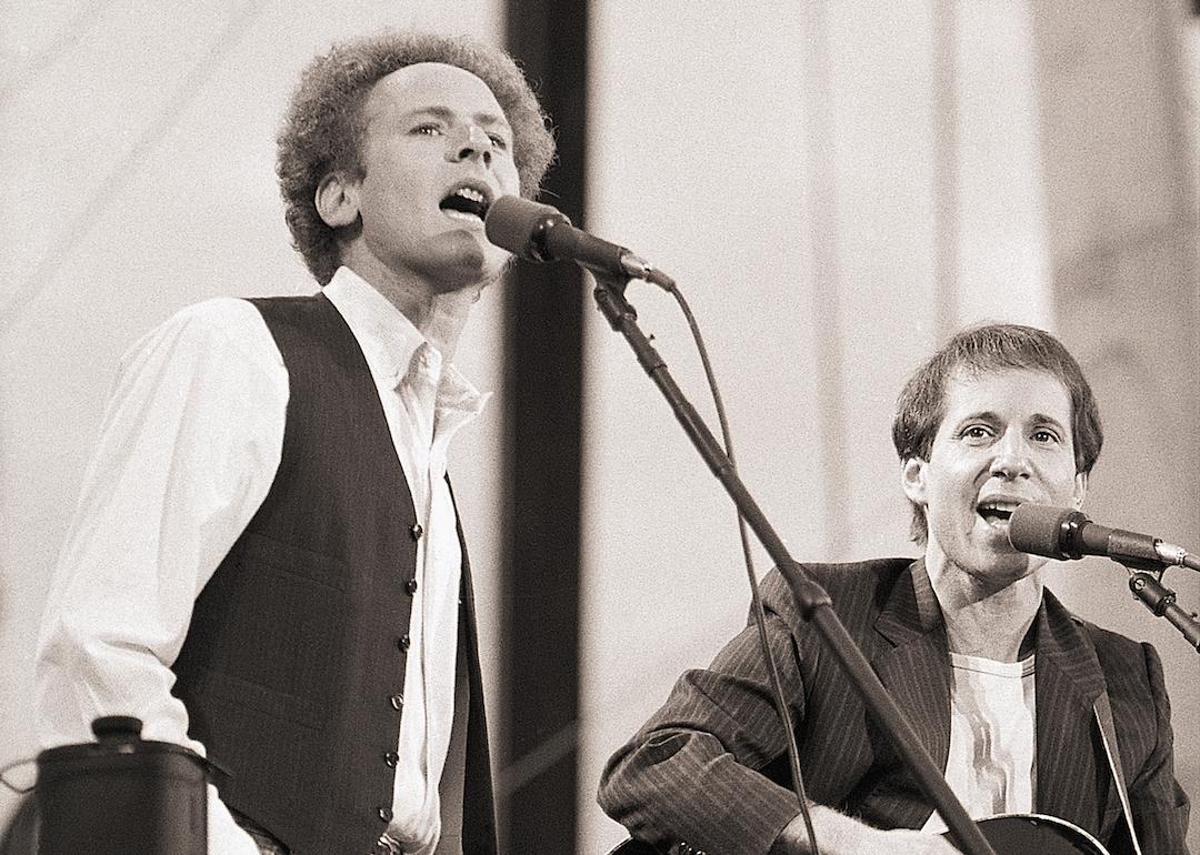 Art Garfunkel and Paul Simon perform for more than 500,000 fans in Central Park.