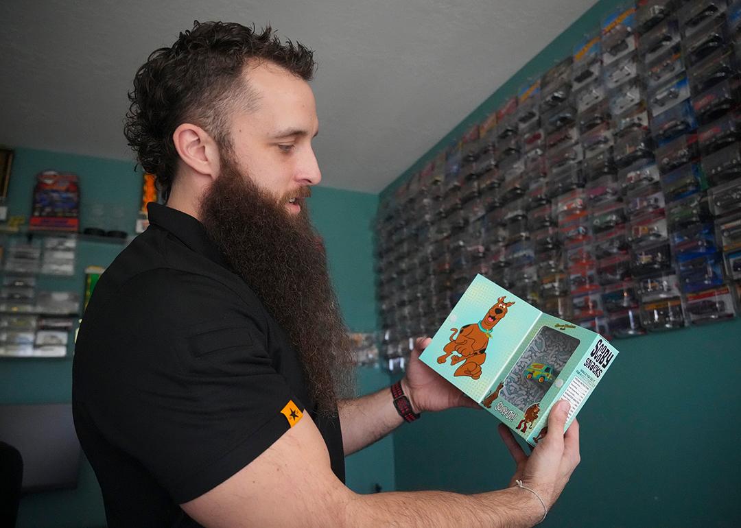 Ian Weber, a Hot Wheels collector of 18 years, talks about a Scooby-Doo Hot Wheels van in his collection at his home in Lehi.
