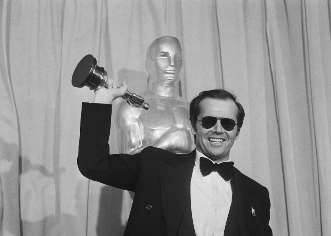 Actor Jack Nicholson waves his Best Actor Oscar for 'One Flew Over the Cuckoo's Nest' at the 48th Annual Academy Awards.