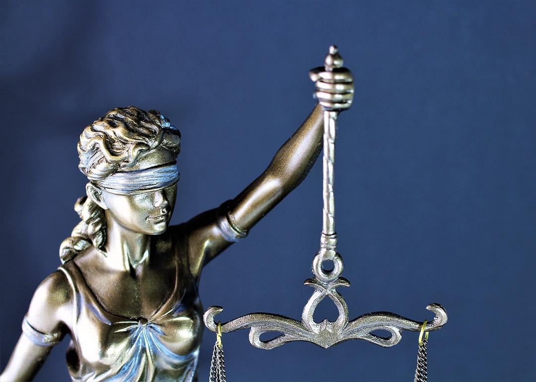 A figure of Justitia or Lady Justice.