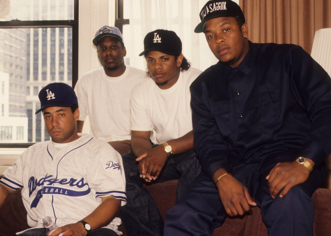 Rappers MC Ren, DJ Yella, Eazy-E and Dr. Dre of the rap group NWA pose for a portrait in 1991 in New York, New York.
