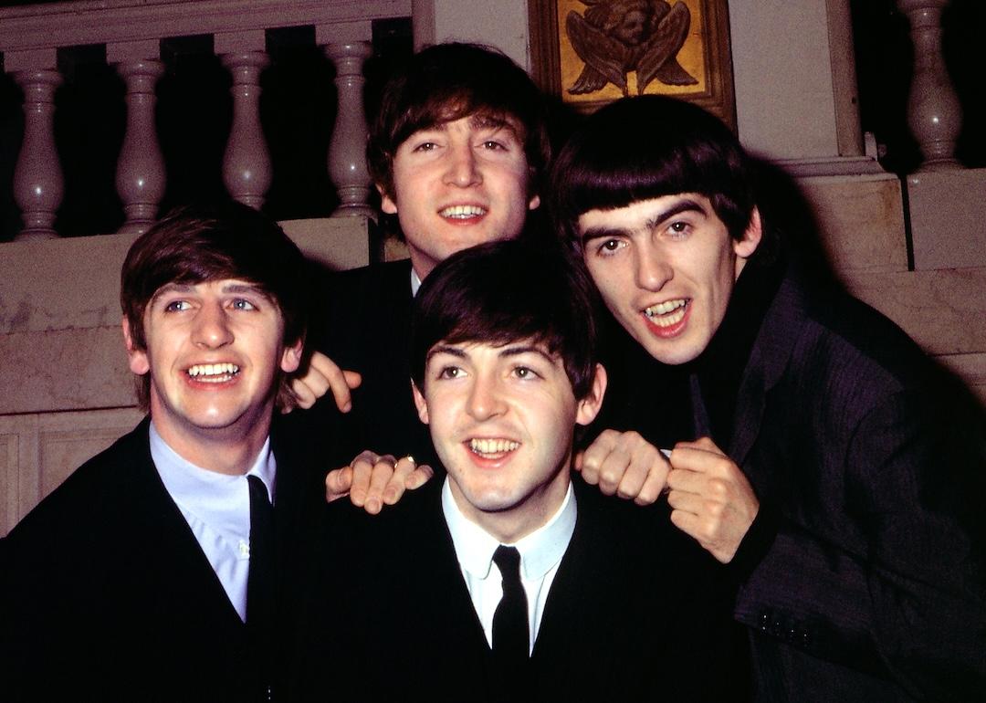 The Beatles pose for a portrait in suits, circa 1964. (L–R) Ringo Starr, John Lennon, Paul McCartney, and George Harrison.