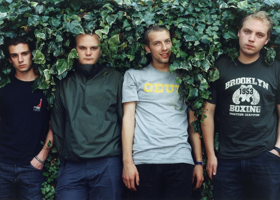 Coldplay pose for a group portrait in the UK, July 1. (L–R) Guy Berryman, Will Champion, Chris Martin, and Jonny Buckland.