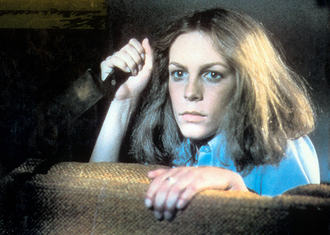 Jamie Lee Curtis holds a knife in a scene from the film 'Halloween', 1978.