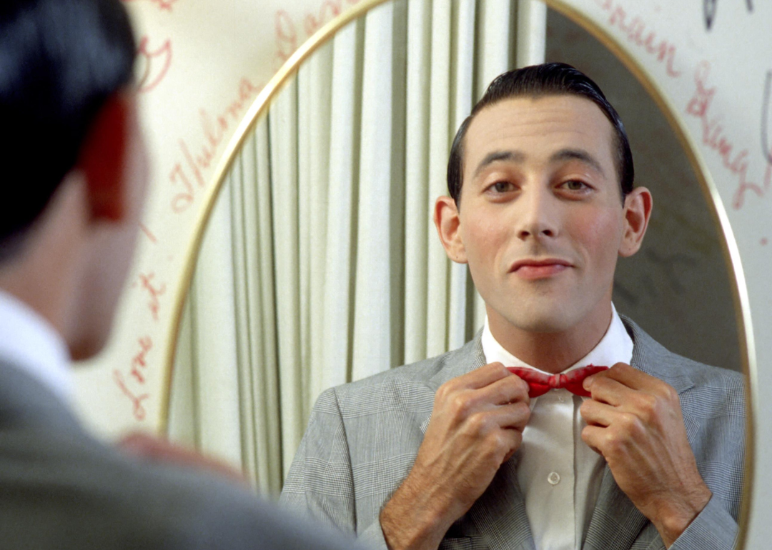 Actor Paul Reubens poses for a portrait dressed as his character Pee-wee Herman in May 1980 in Los Angeles, California. 