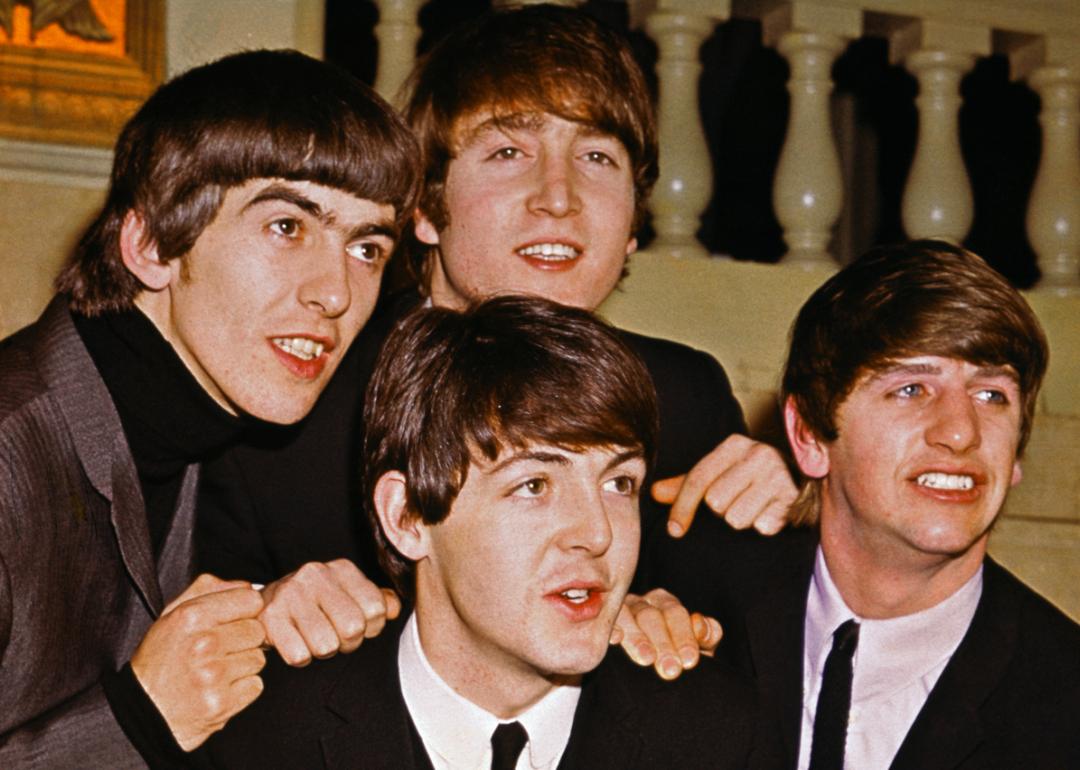 The Beatles smiling together: from left to right: George Harrison, John Lennon, Paul McCartney, and Ringo Starr
