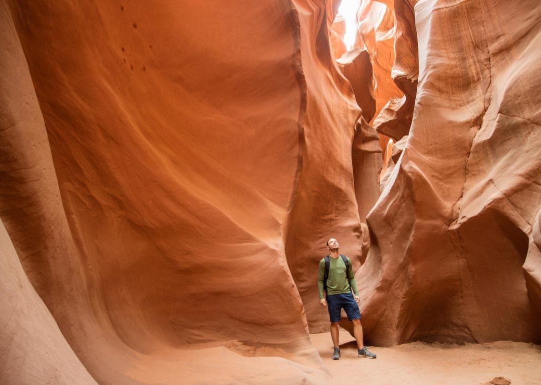 Man exploring Antelope Canyon, Arizona, USA
