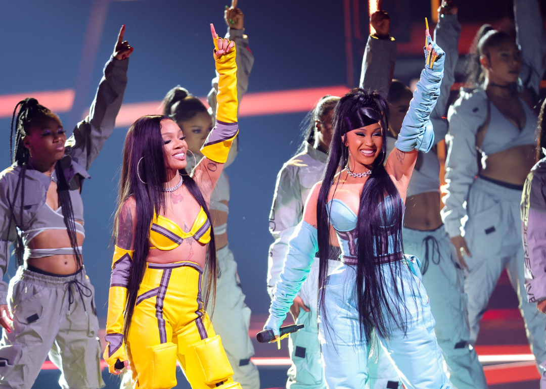 GloRilla and Cardi B perform onstage at the 2022 American Music Awards.