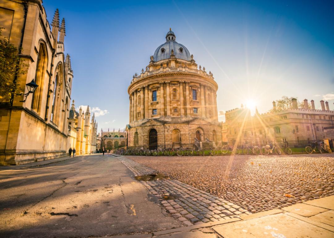 Radcliffe Square with the Science Library and sunset flare in Oxford, England.