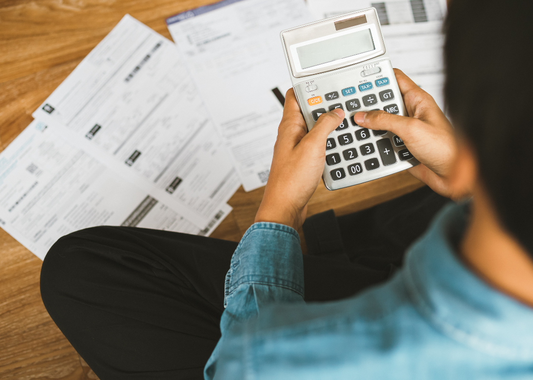 A man calculating his mortgage