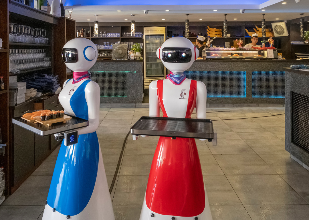 Waiter robots bringing dishes to customers in Rapallo, Italy.