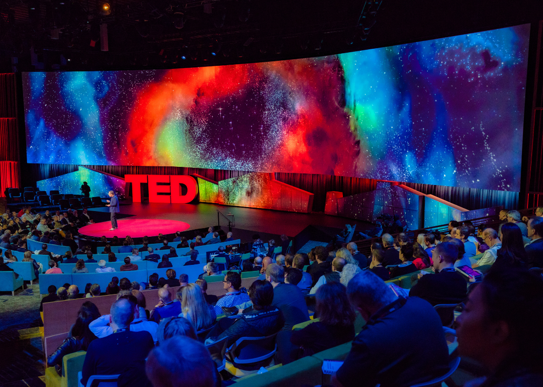 A TED talk inside the David Rockwell designed theater at TED 2018.