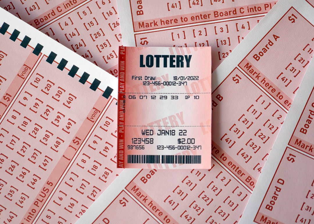 A lottery ticket on gambling sheets.