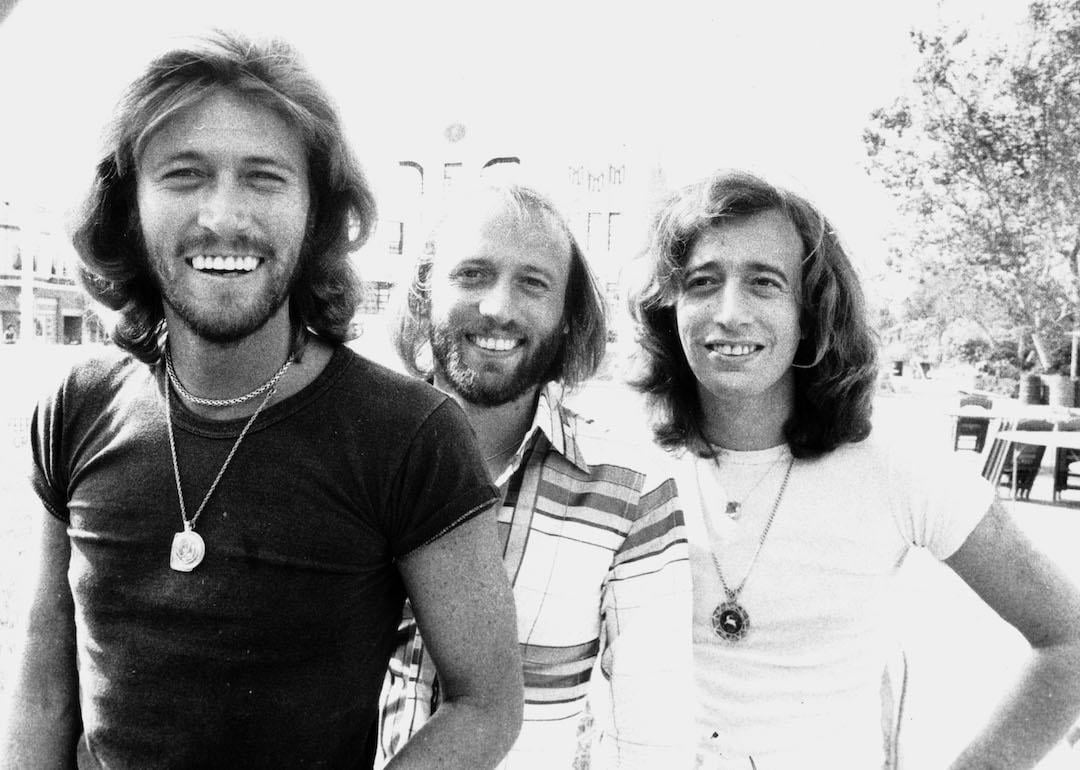 The Bee Gees pose for a portrait.