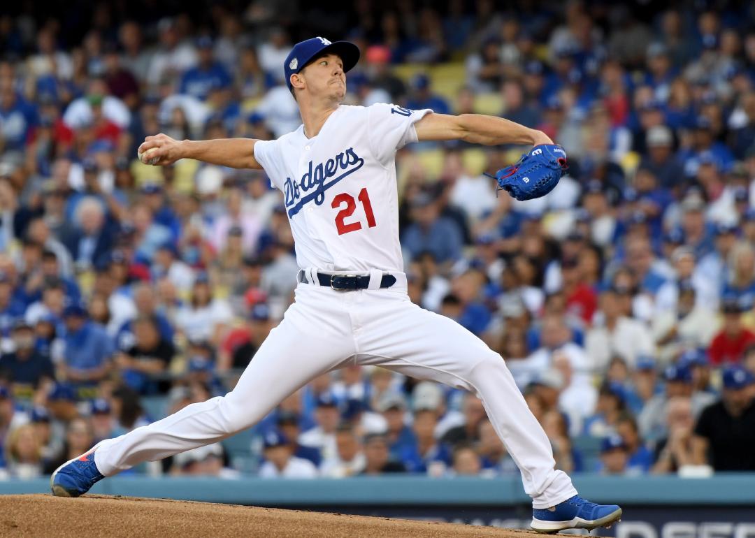 Walker Buehler of the Los Angeles Dodgers delivers the pitch during Game Three of the 2018 World Series.