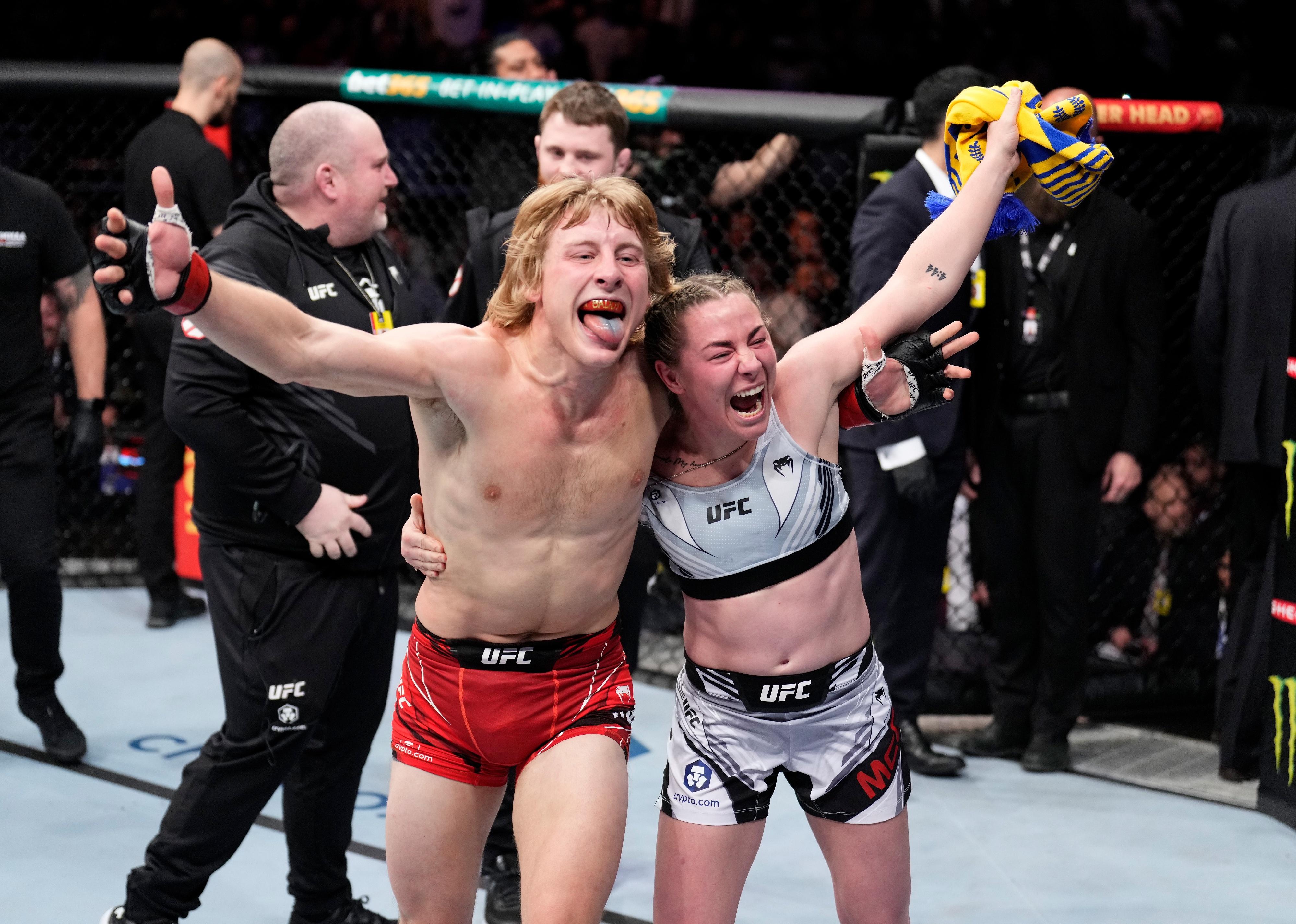 Paddy Pimblett of England and Molly McCann of England celebrate a victory.