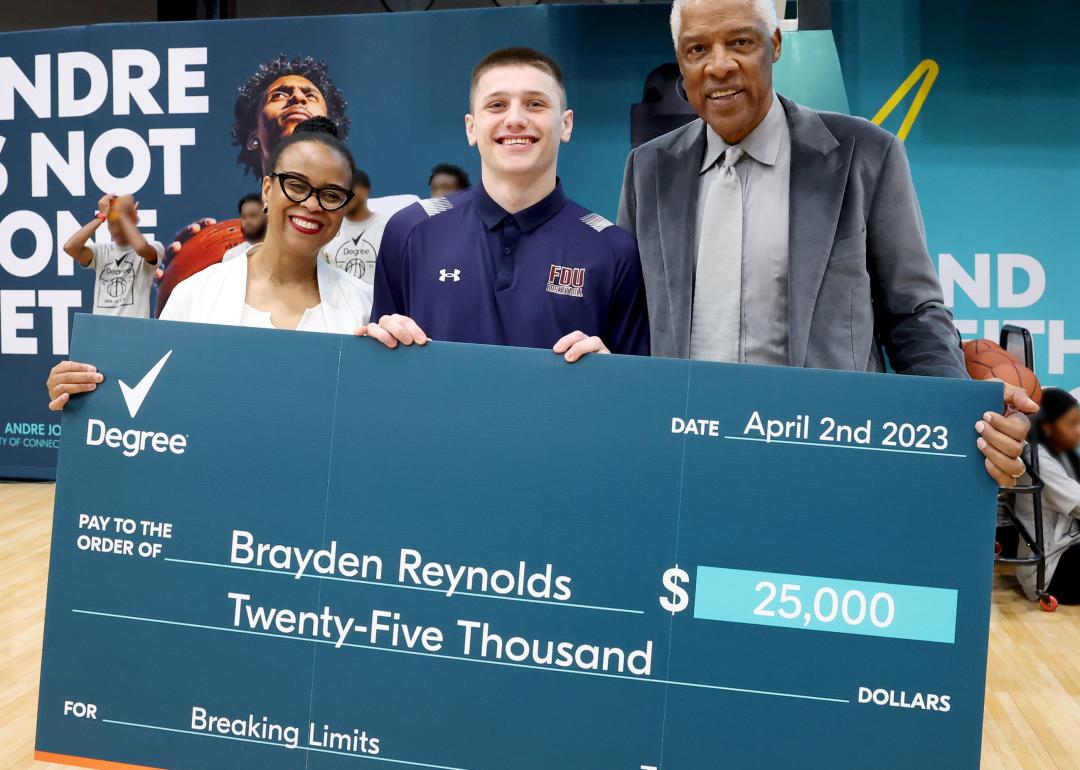 Desi Okeke, Brayden Reynolds, and Julius Erving are seen at March Madness Fan Fest.