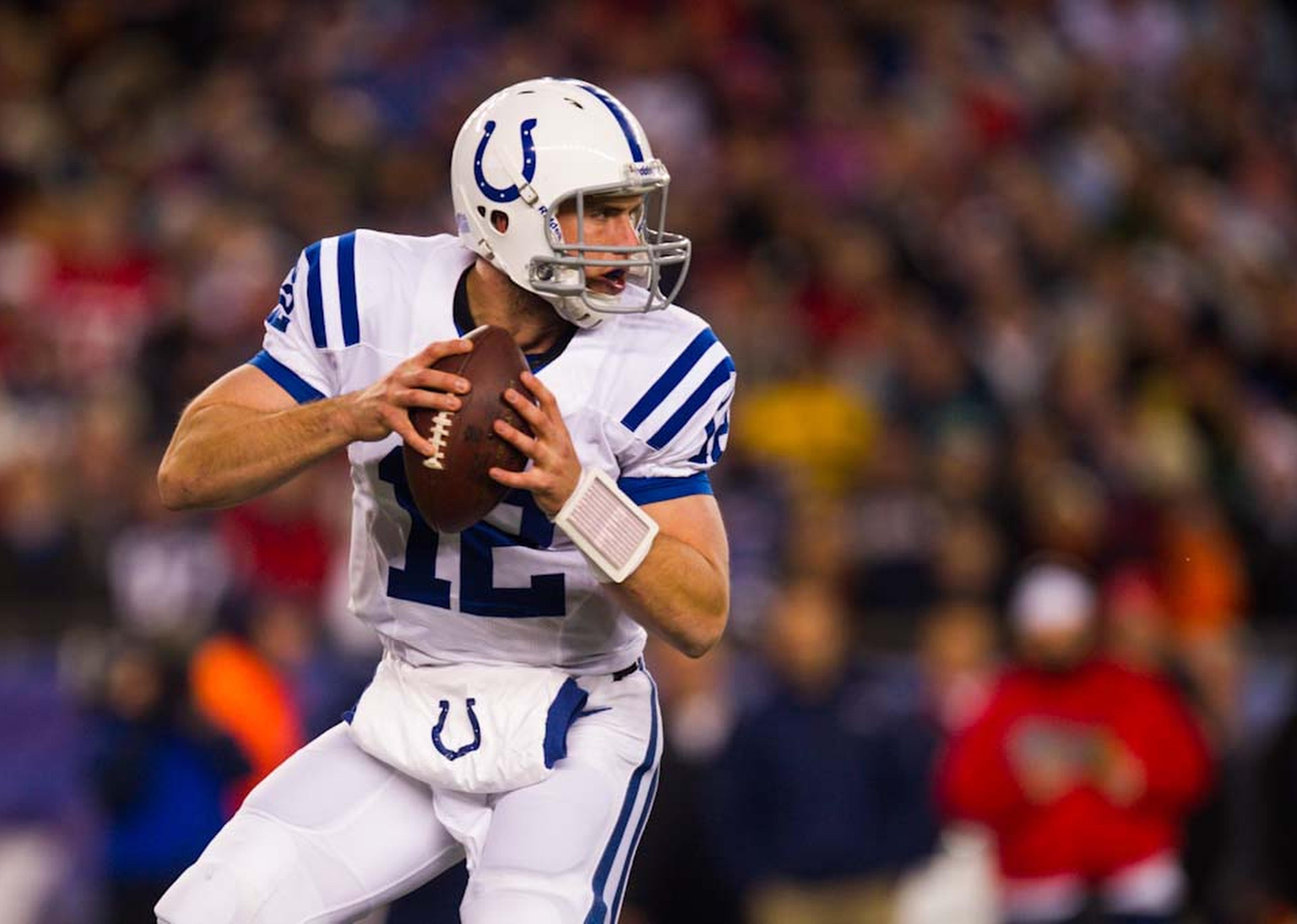 Andrew Luck of the Indianapolis Colts drops back to throw a pass during a game