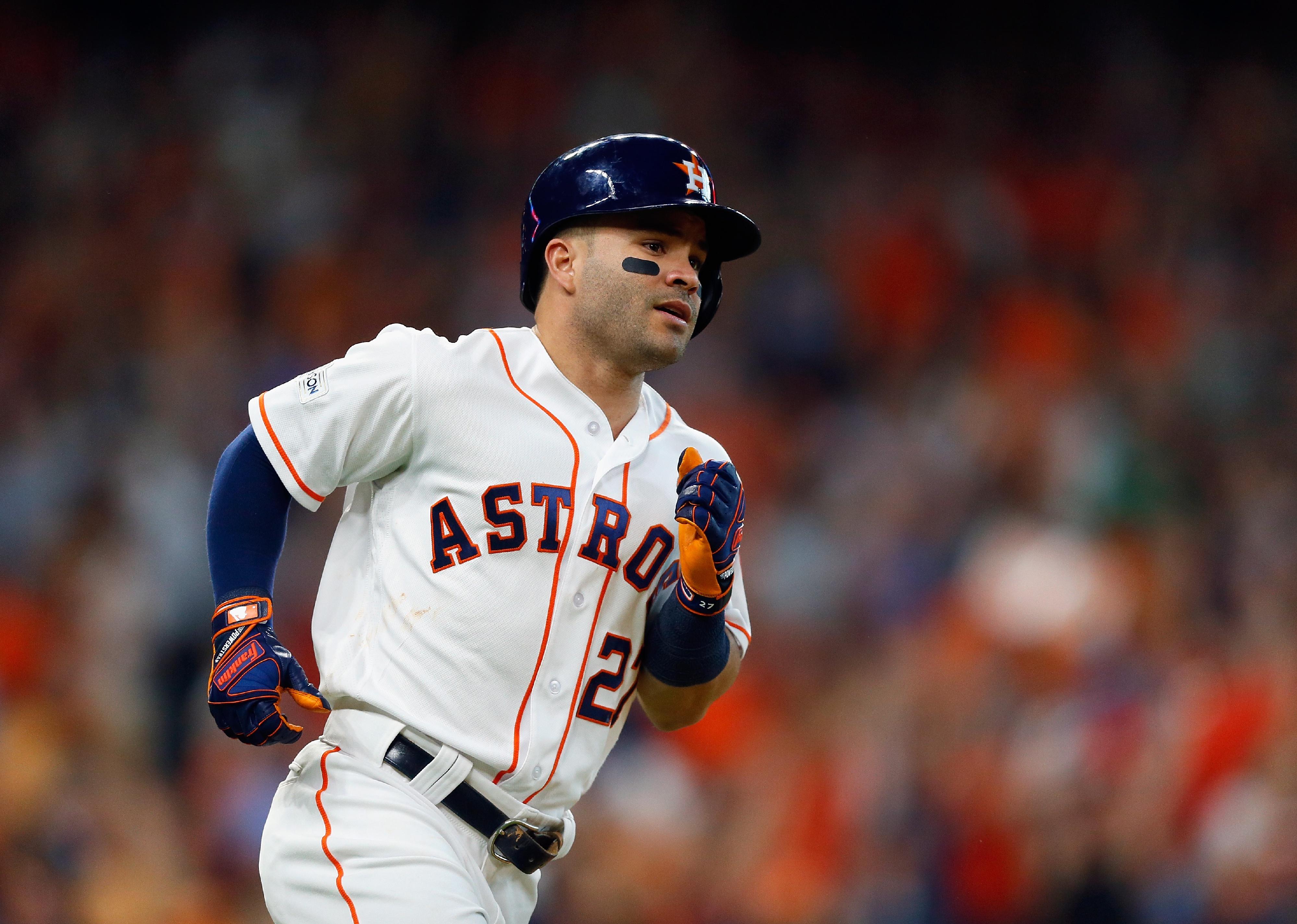 Jose Altuve of the Houston Astros runs bases after hitting a home run