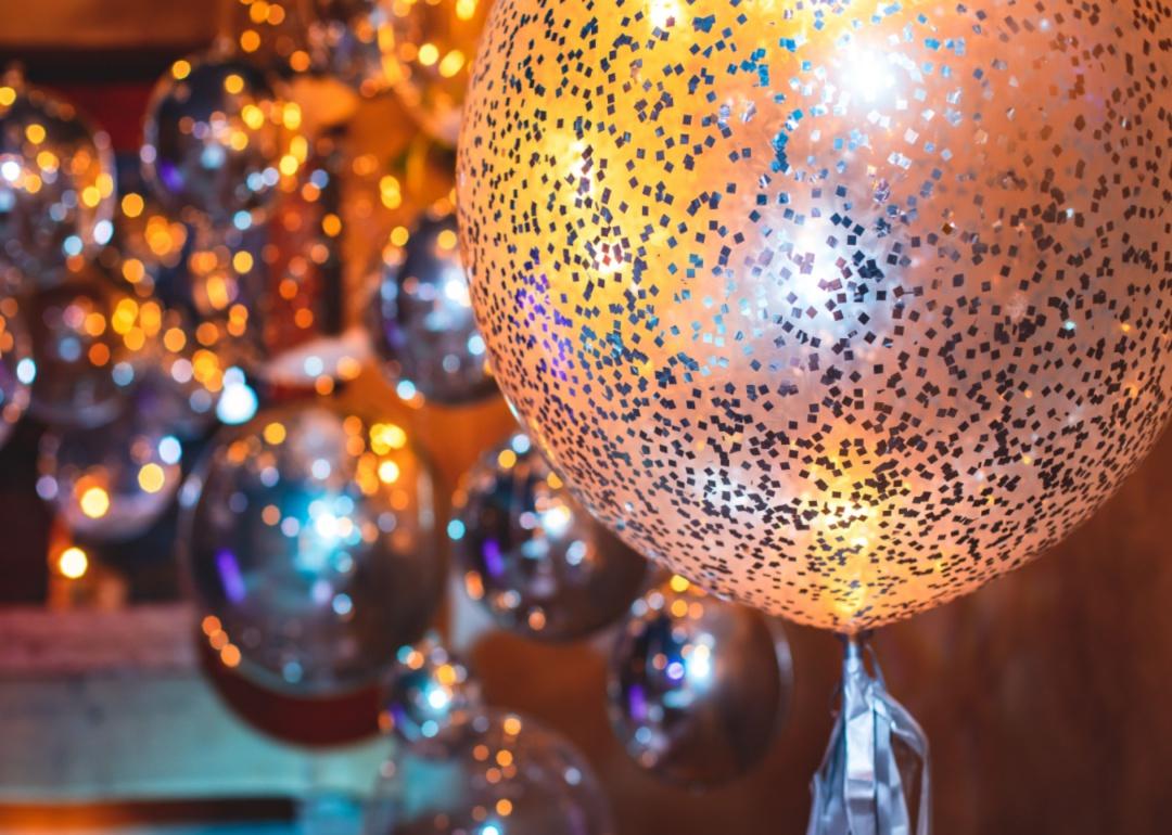 Gold sparkling balloons.