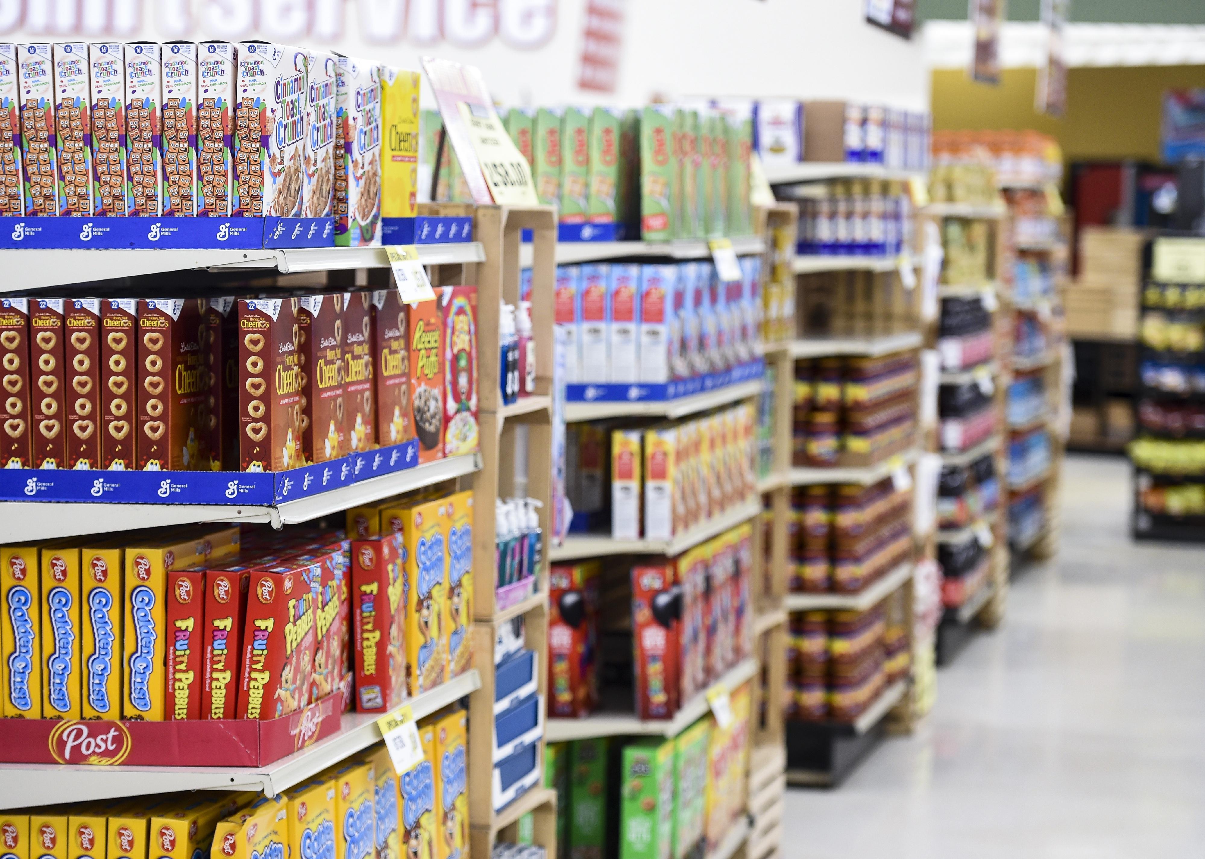 Grocery store end caps lined with cereals.