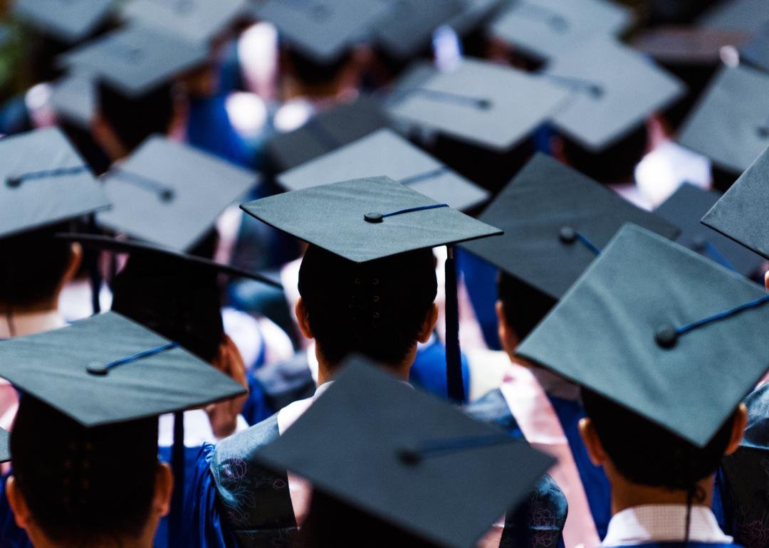 Large group of graduation caps during commencement.