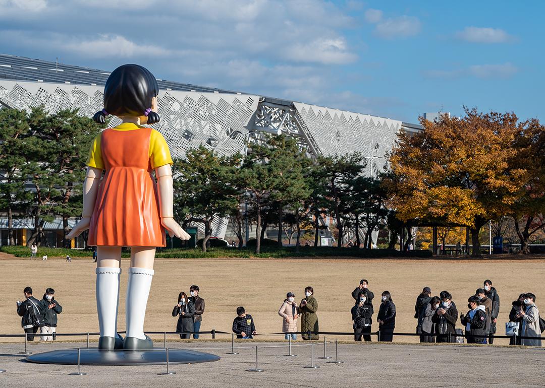 A view of the Seoul Olympic Stadium from the Olympic Park in South Korea and where tourists flock to photograph the giant "Yeonghee" doll from Squid Games.