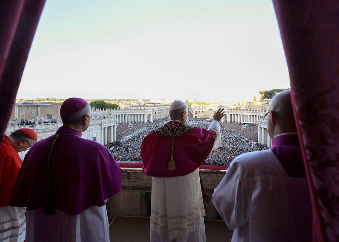 Newly elected Pope Leo XIV, Robert Prevost, waving at the crowd on the main central loggia balcony overlooking St. Peter's Square on May 08, 2025 in Vatican City, Vatican.