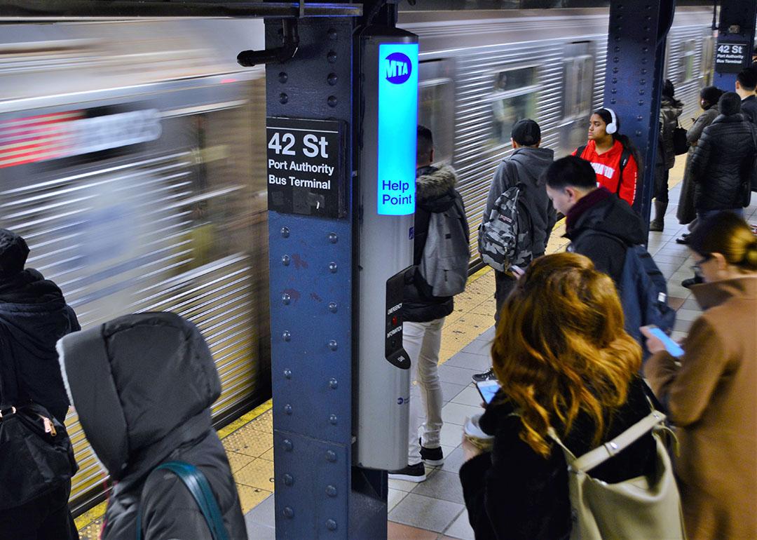 Rush hour commuters using NYC 42 Street Port Authority Transportation.