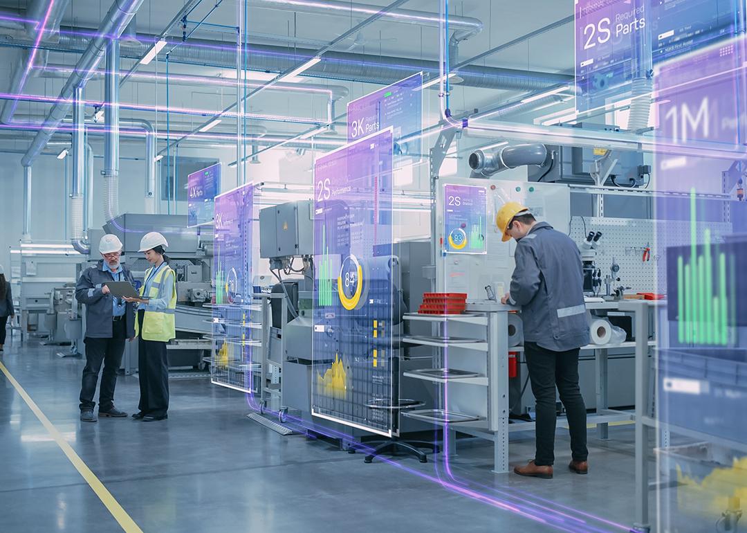 A factory optimizes digitalization where workers are working on high-tech equipment.