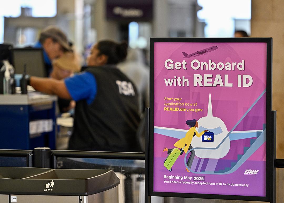 Air travelers go though TSA security at John Wayne Airport in Santa Ana, California.