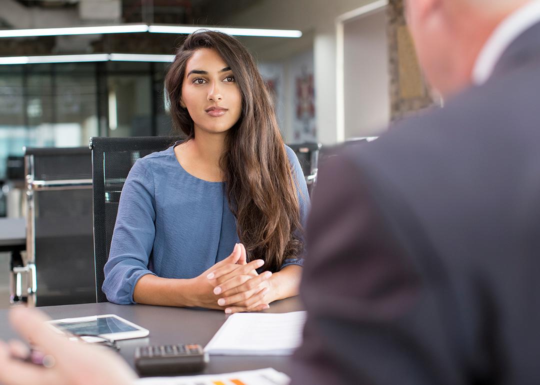 Young female professional meeting with a hiring manager during a job interview.