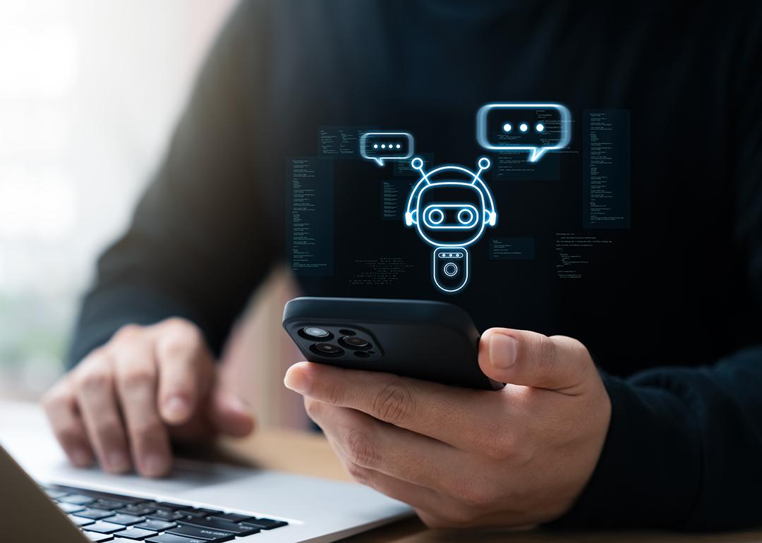 Businessman using smartphone to connect to an AI chatbot.