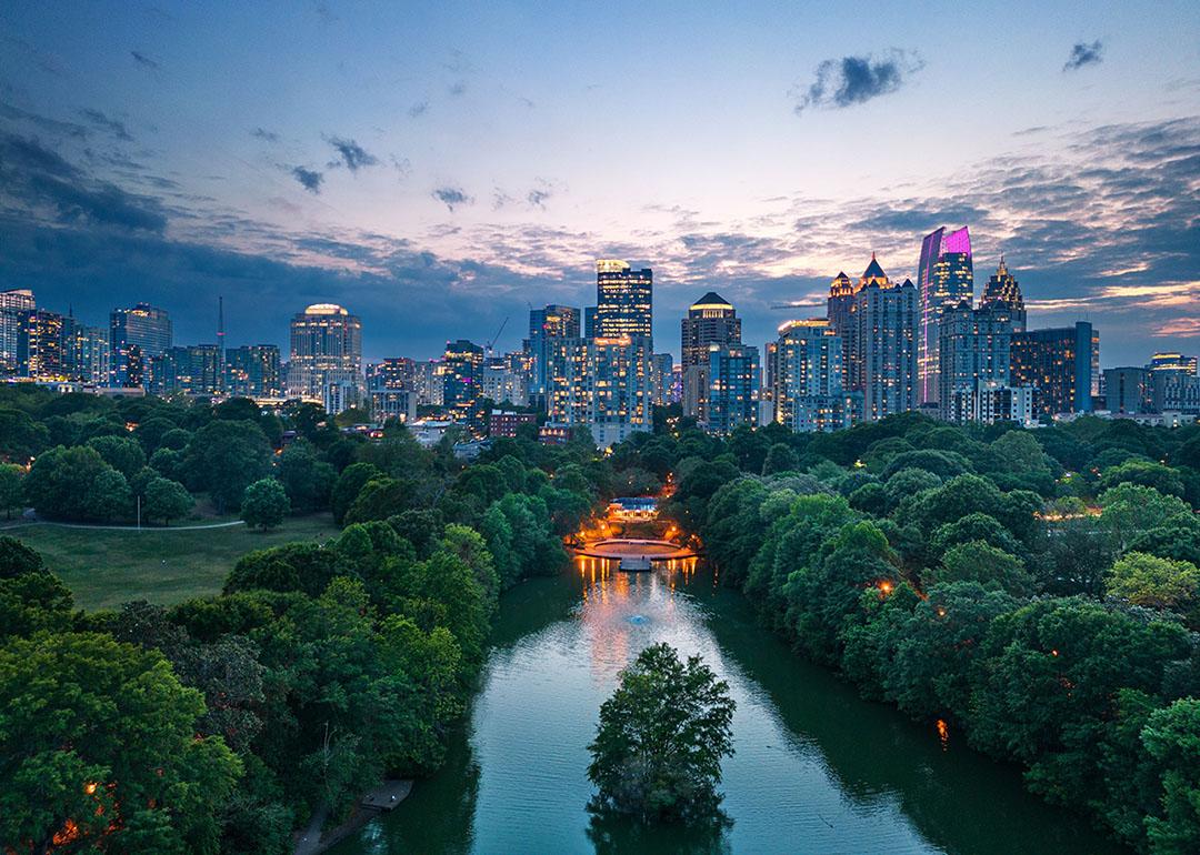 Atlanta, Georgia, USA overlooking Piedmont Park at dusk.