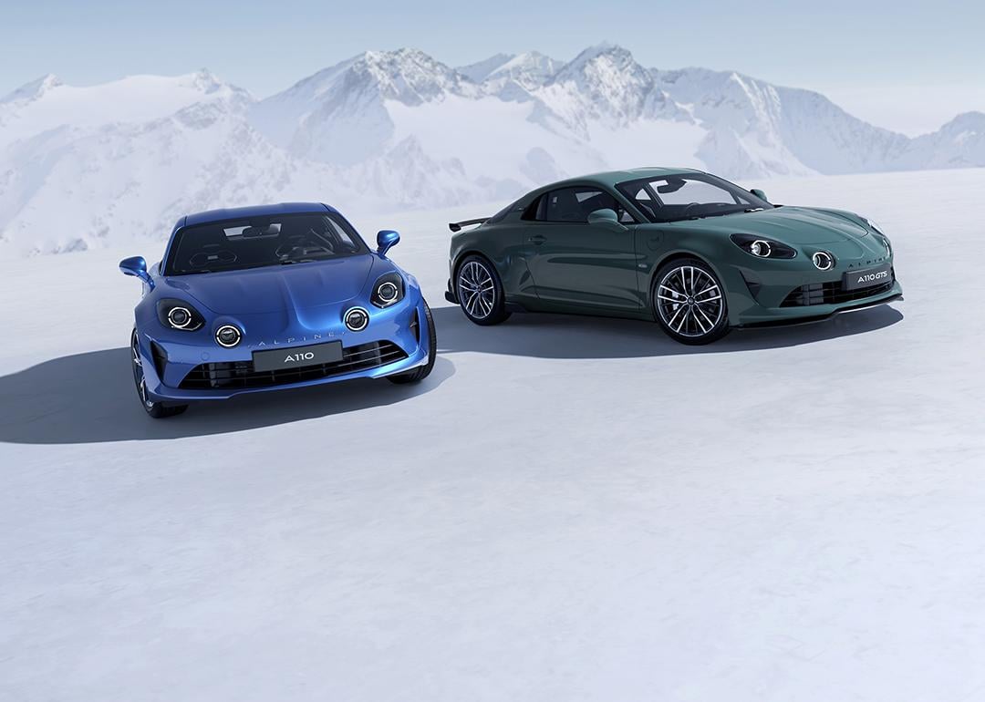 A blue and green Alpine 110 on a winter location.