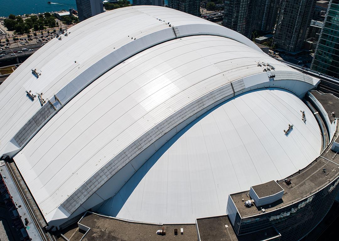 Workers install a new roof on the Rogers Centre, home of the Toronto Blue Jays baseball team.