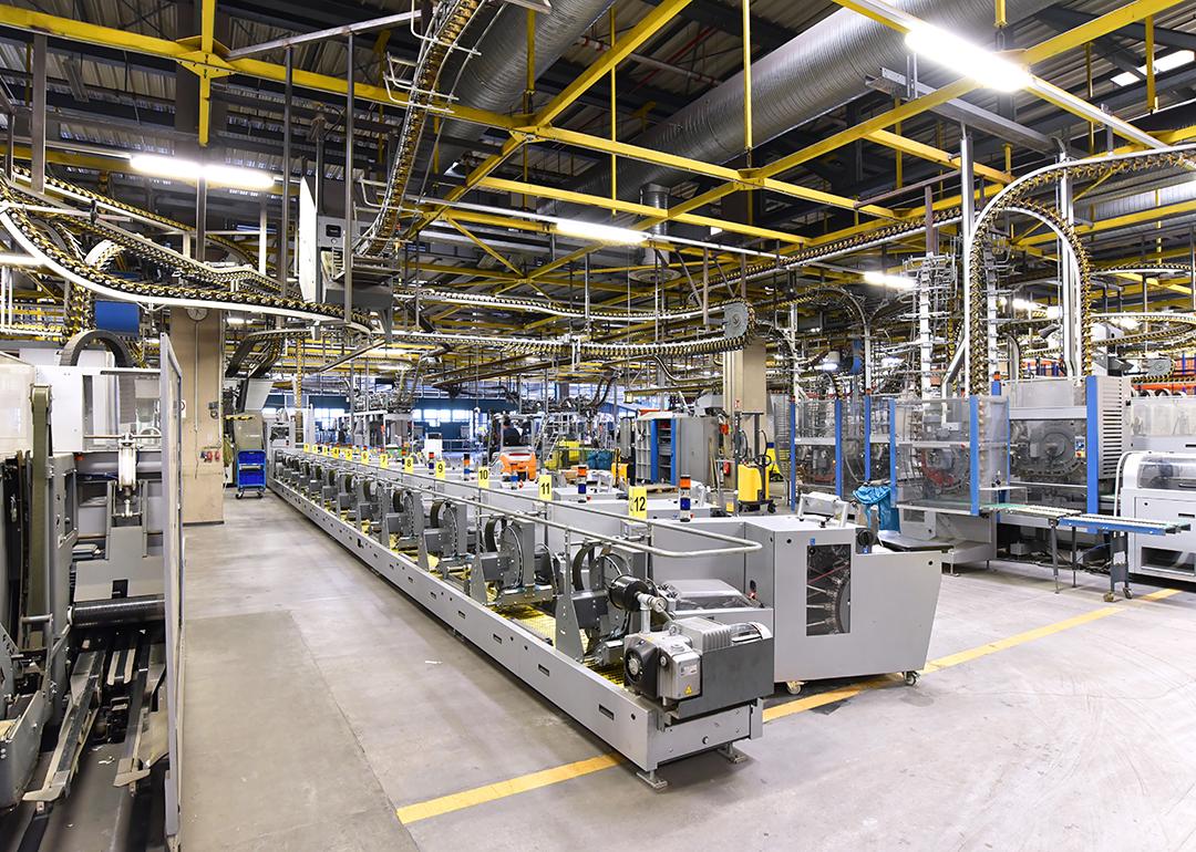 A large printing business for newspapers and magazines and their paper rolls and offset printing machines.