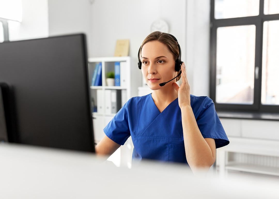 A nurse on a virtual consultation.