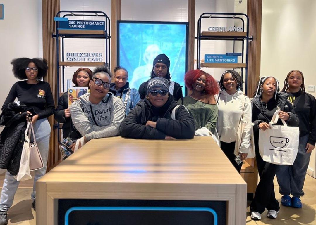 Group phot of mentors and mentees at H.D. Woodson’s Attendance Pep Squad who met with community partners to learn how to build a stronger school culture. 