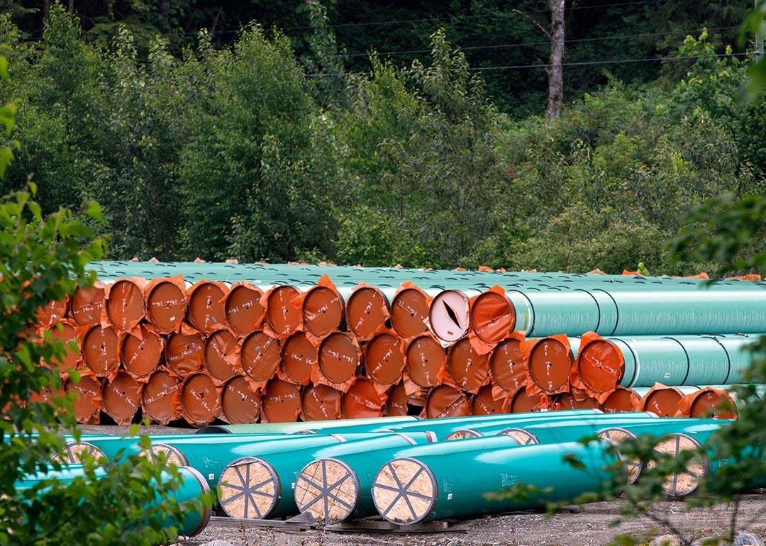 Pieces of the Trans Mountain Pipeline project sit in a storage lot outside of Hope, British Columbia, Canada.